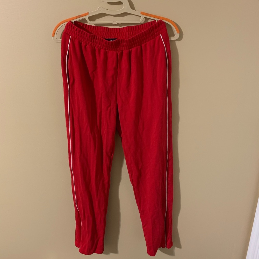 Red track pants